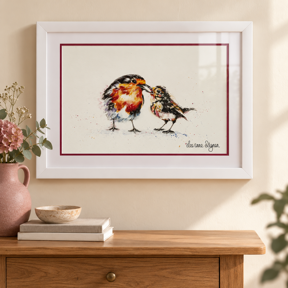 Framed robin watercolour styled in a modern home interior